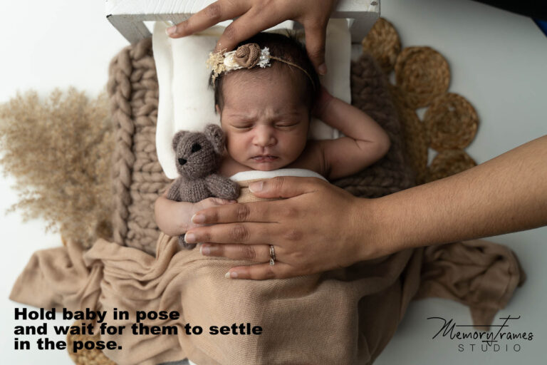 baby girl posed for newborn photoshoot at Kitchener newborn photography, baby photos at home