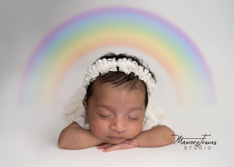 baby posed for newborn photoshoot kitchener studio, raibow baby kitchener newborn photogrpher