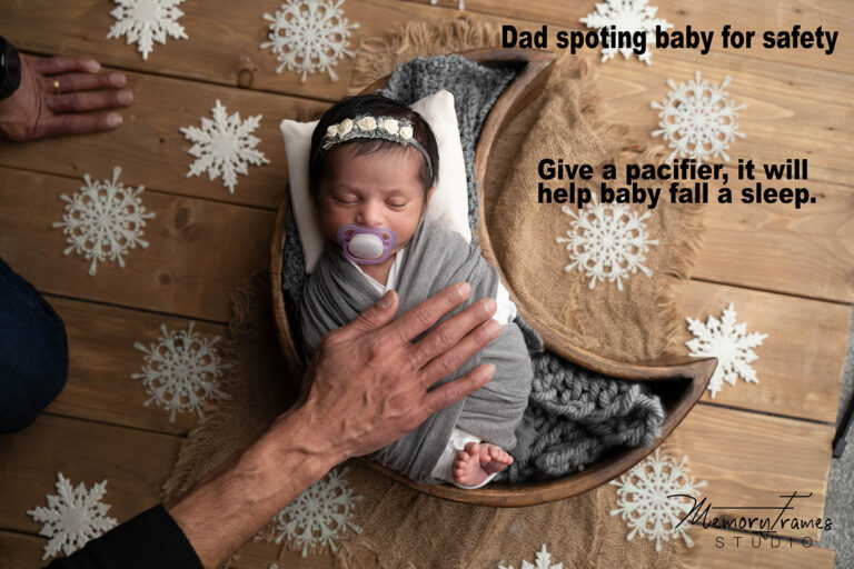 baby posed in moon prop for newborn photoshoot, kitchener newborn photographer