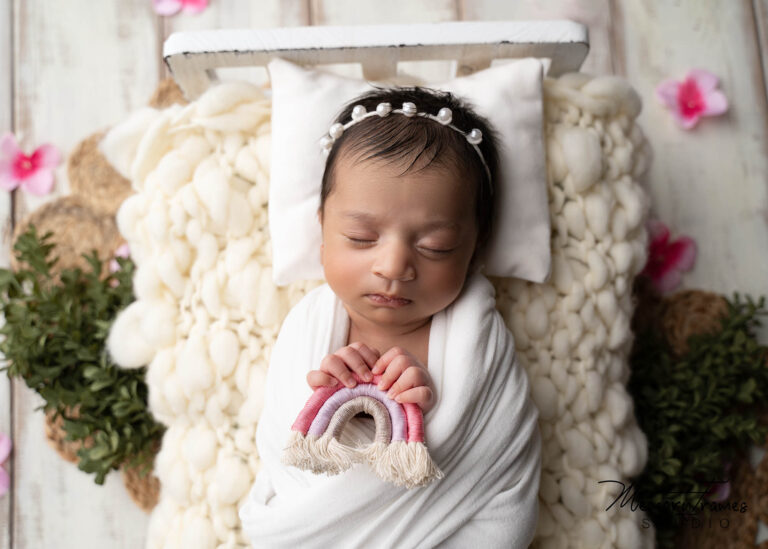 rainbow baby props, rainbow baby photoshoot, baby holding rainbow for newborn photoshoot in kitchener