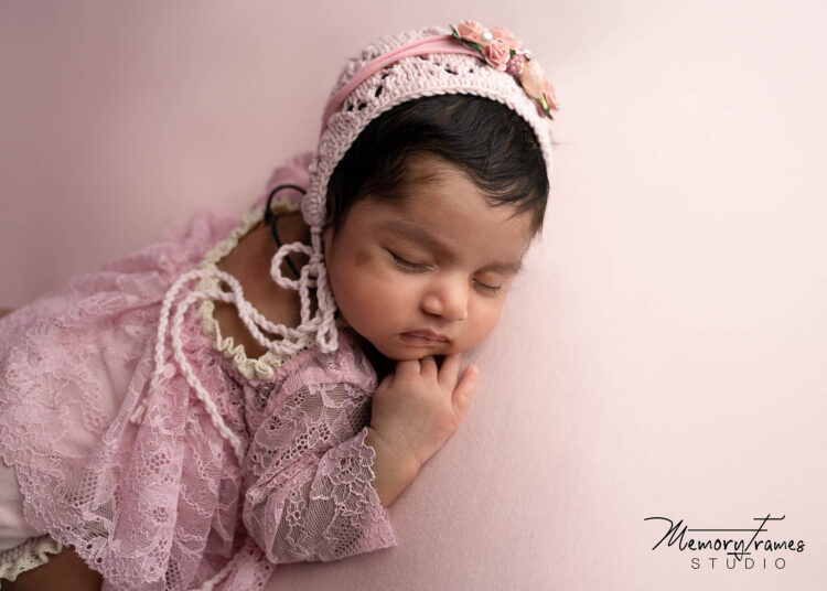 baby posed for newborn photoshoot, kitchener newborn photography studio, waterloo newborn photographer, baby photographer near me