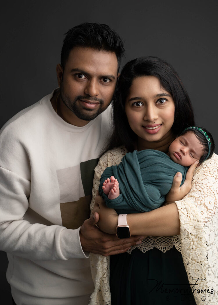 parents posed for newborn photoshoot in kitchener studio, cambridge newborn photography