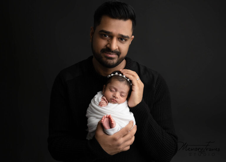 newborn family photoshoot, newborn baby held by father for photoshoot, kitchener newborn photographer