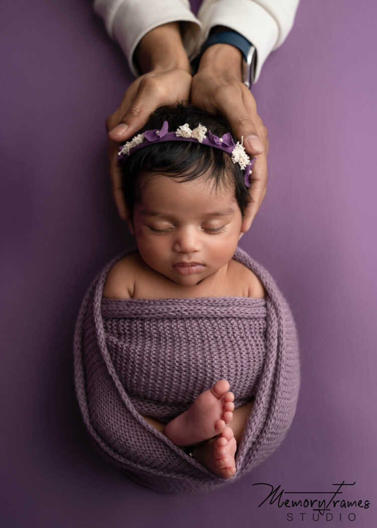 newborn baby posed for newborn photoshoot, newborn photography cambridge